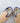 Paire de chaussons charentaises mixte "Kerema" bouclette camel liseré bleu